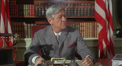 Why bother me with all this Send him a marshal Anything for peace - Carry on Cowboy