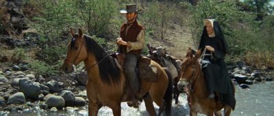 Why did you put that dead man on the horse - Two Mules for Sister Sara