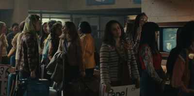 Why do we have to wait
in this long line?
-We need, - Mrs. America