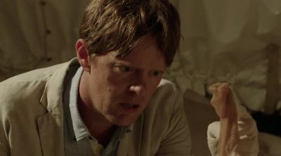 Why is she holding this? - Death in Paradise