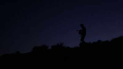(wind howling)
(chorus of coyotes yipping) - The Outwaters