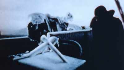 WINDSWEPT WAVES ENVELOP
EVERYTHING IN ICE. - The Pacific War in Color