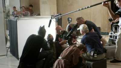 With a boom microphone, - Making Waves: The Art of Cinematic Sound