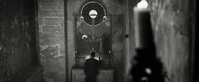 With a hard-soled shoe
or perhaps a boot. - Murder on the Orient Express
