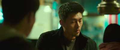 With a trench coat and
a cigarette in his mouth, - Confidential Assignment 2: International