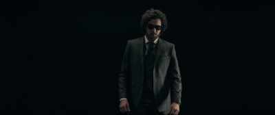 With a wig and a false beard.
- Laugh. - Carbone