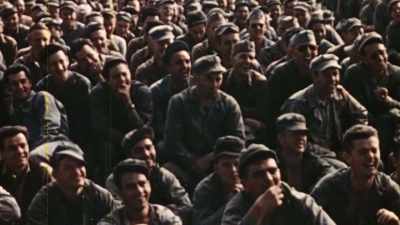 WITH DANNY KAYE PLAYING IT UP
FOR OCCUPATION TROOPS. - The Pacific War in Color