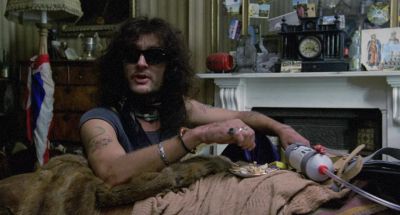 With this far out looking hat - Withnail &amp; I