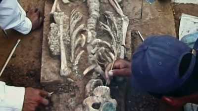 WITHIN IT IS A MAN
WEARING ELABORATE JEWELRY, - Lost Cities of the Amazon