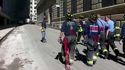 Without thought for his
own safety, he rushed - 9/11: The Day the World Stood Still