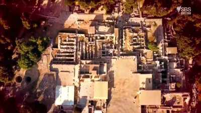 WOMAN: Arthur Evans started
excavating Knossos, on Crete, - Curse of the Ancients with Alice Roberts