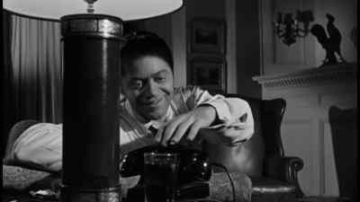 Woman: Don't answer it. - Down Three Dark Streets