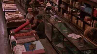 Woman:
LOOK AT THESE PRICES. - The Grass Harp