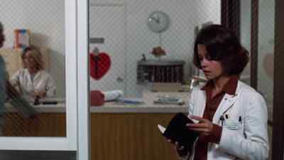 WOMAN [ON INTERCOM]:
Dr. Williams, Dr. Peter Williams, 1174. - Coma
