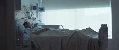WOMAN: (ON P.A.)
Dr. Nyman, reception area, please. - The Rider