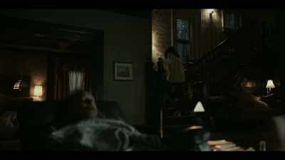 (woman on TV continues
indistinctly) - American Rust