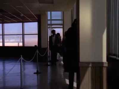 WOMAN ( over PA ):
Flight 4 for New York now loading, Gate 7. - The Streets of San Francisco