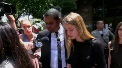 WOMAN: She says Johnny
smashed her face with an iPhone - Johnny vs Amber