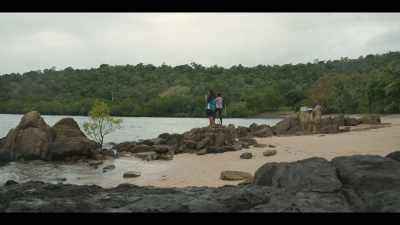 (woman singing
in native language) - Black Snow