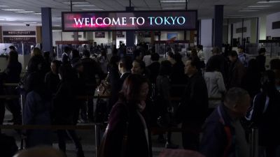 (woman speaks Japanese
over P.A.) - FlashForward