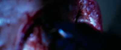 [woman]
...the body was scored first - Spiral: From the Book of Saw