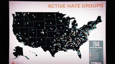 Woman: THERE ARE CURRENTLY
784 ACTIVE HATE GROUPS OPERATING - Why We Hate