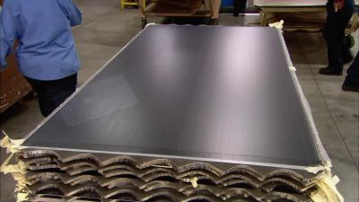 WORKERS SLAP ON LABELS - How It's Made