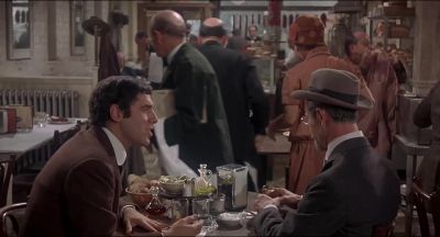 Writing in a little notebook - The Night They Raided Minsky's