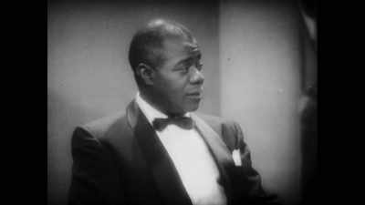- Yes.
- And while I... We travel a lot. - Louis Armstrong's Black & Blues