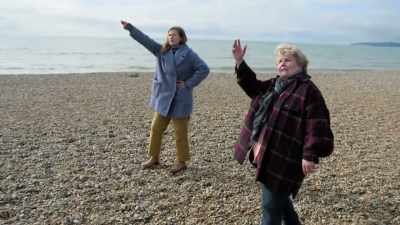 -- Yes. -- ..standing at the balcony,
waving. - Extraordinary Escapes with Sandi Toksvig