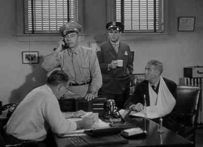 - Yes?
- We're throwing Mickey out the front gate. - Riot in Cell Block 11