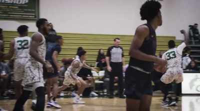 Yonas Gedlu dribbling
against Malik Muhammad. - Last Chance U: Basketball