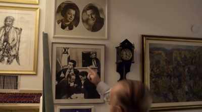 Yoram Sheftel shows his mother
what he achieved. [CHUCKLES] - The Devil Next Door