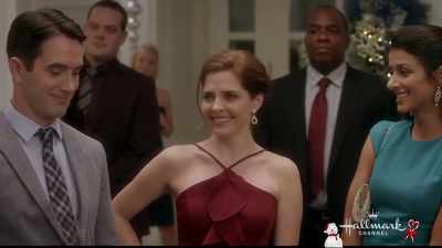 You all know her
from the office, - Mingle All the Way