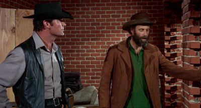 You expect me to sit here in this lousy cell on that - Support Your Local Sheriff!