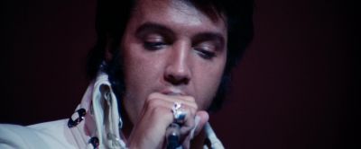 You got to lean on your knee like this Like a fool - Elvis: That's the Way It Is