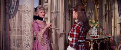 You have an impossible nose a nondescript mouth - Gigi