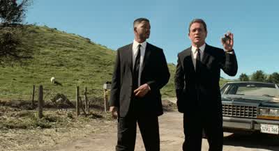 You here to make fun of me tooNo ma'am We at the FBI do not have a sense of humor we're aware ofMay we come in - Men in Black