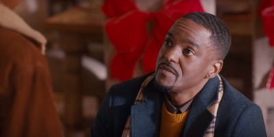 You know, the
holiday can be tough - Christmas with a Kiss