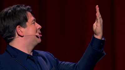 You look at your arm as if to say,
"This will hurt, I do apologize. - Michael McIntyre: Showman