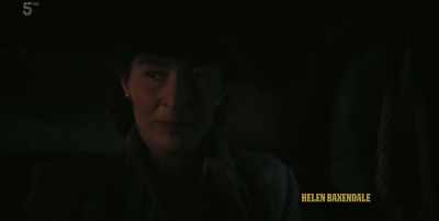 You look like Mrs Danvers.
HE CHUCKLES - Agatha and the Midnight Murders
