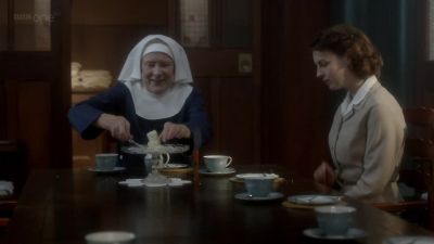 You must have another slice. - Call the Midwife