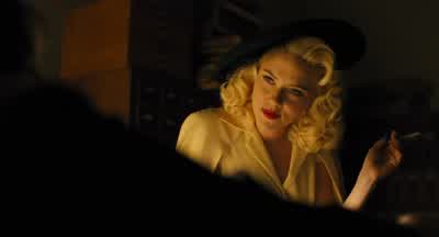 You must have very strong forearmsIs it hard squeezing it like thatIt's part of the job miss - Hail, Caesar!