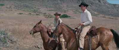 You saw that kid play in
back of Doc's house? - Flaming Star
