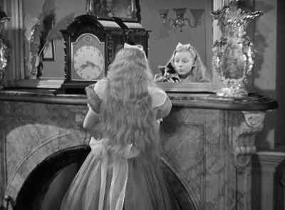You see Dinah, as soon as I hold you up, - Alice in Wonderland
