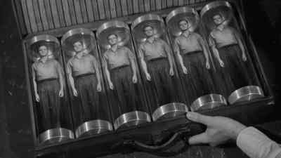 You see, here's a
whole case full of them. - Attack of the Puppet People