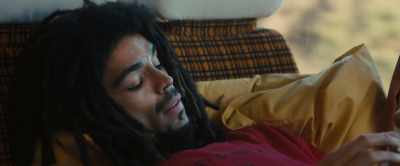 ["You Should Be Dancing"
playing] - Bob Marley: One Love