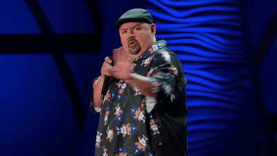 You start off in English.
"Hello, sir, may I..." - Gabriel Iglesias: Stadium Fluffy