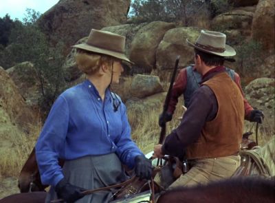 You, uh...
carrying any weapons,
lady? - The Virginian
