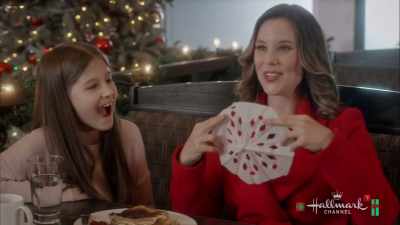 You unfold to reveal
the magical snowflake. - Christmas in Evergreen